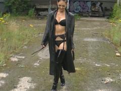 Cath Is Striding Out In Lingerie, A Sexy Leather Trench Coat And High Heeled Boots, Which A